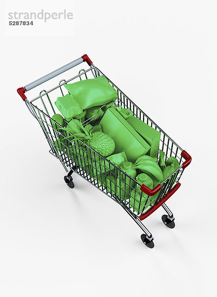 Einkaufswagen gefüllt mit grünen Lebensmitteln