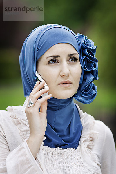Handy  Frau  sprechen  Kopftuch