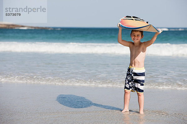 Ecke Ecken Junge - Person über halten Surfboard Meer jung