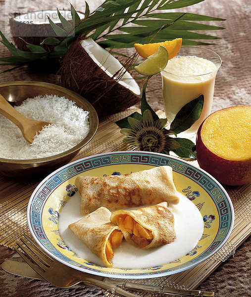 Reispfannkuchen mit Mango und Kokossauce  Indonesien  Rezept gegen Gebühr erhältlich