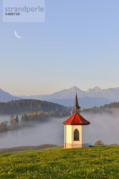 Kapelle am Hegratsrieder See bei Füssen  Mond  digitales Composing  Allgäu  Bayern  Deutschland  Europa