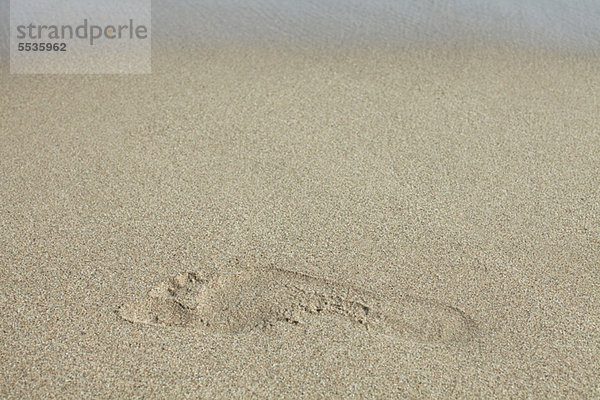 Fußabdruck im Sand