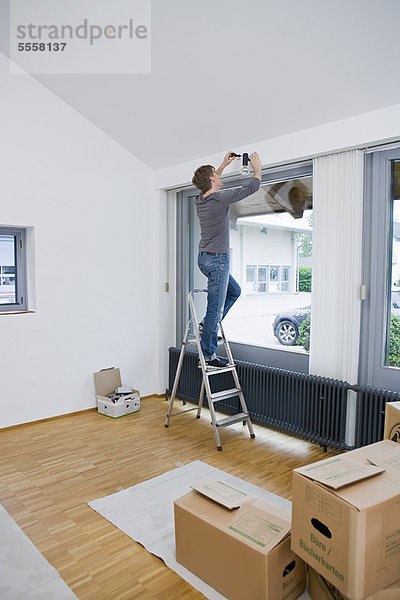 Männermalerei im neuen Haus