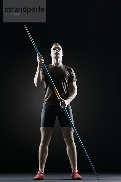 Athlet stehend mit Javeline