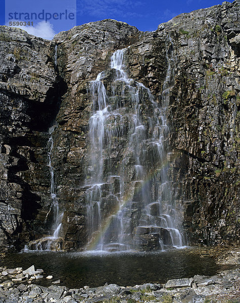 Storulfossen  auch Brudesl¯ret  Brudeslöret  Wasserfall des Flusses Store Ula  mit Regenbogen  bei MysusÊter  Mysuseter  Rondane Nationalpark  Norwegen  Skandinavien  Europa