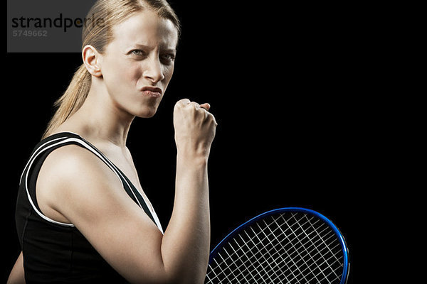 Tennisspieler beim Luftschlag