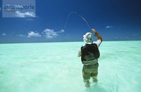 Mann Fliegenfischen  Seychelle Islands  Seychellen