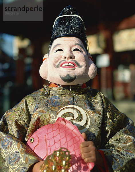 Maskierte Figur am Festival  Japan  Asien