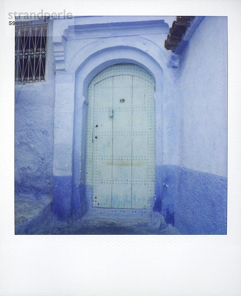 Nordafrika Wand Tradition Tür blau streichen streicht streichend anstreichen anstreichend Afrika Marokko Polaroid