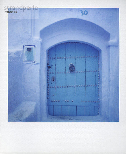 Nordafrika Wand Tradition Tür blau streichen streicht streichend anstreichen anstreichend Afrika Marokko Polaroid