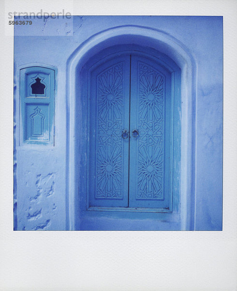 Nordafrika Wand Tradition Tür blau streichen streicht streichend anstreichen anstreichend Afrika Marokko Polaroid