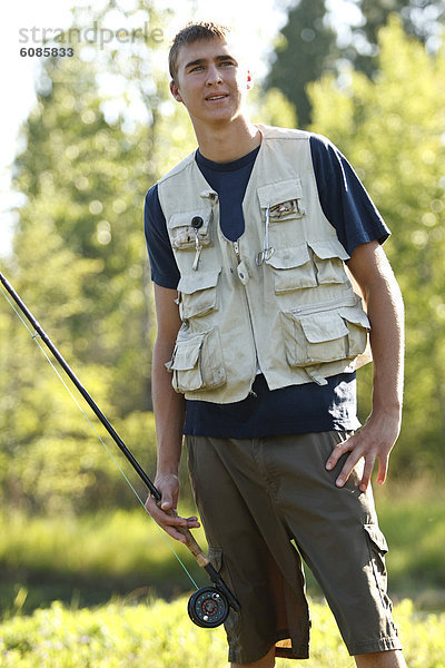 nahe  Portrait  Jugendlicher  Junge - Person  Fluss  angeln  Schwan