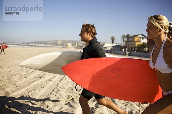 Wasser  Frau  Mann  Tag  Strand  Morgen  fahren  rennen  früh  Pazifischer Ozean  Pazifik  Stiller Ozean  Großer Ozean  Kalifornien  mitfahren  San Diego  Brandung