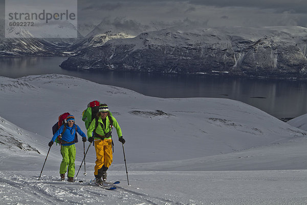 Norway  Lyngen  Skiers touring uphill