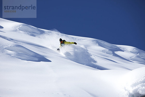 Snowboardfahrer  drehen  Gesichtspuder  Colorado