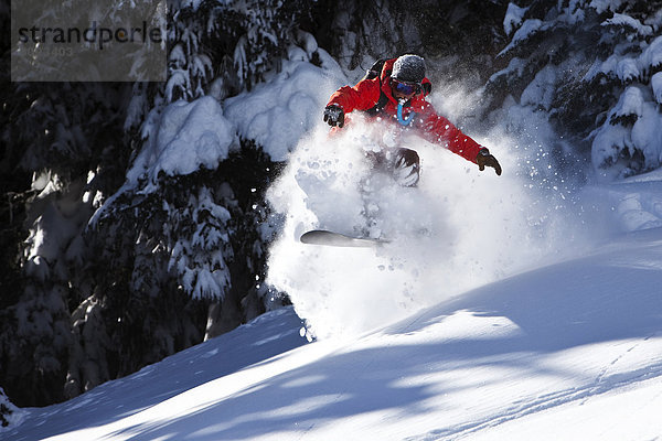 Snowboardfahrer  drehen  Gesichtspuder  Colorado