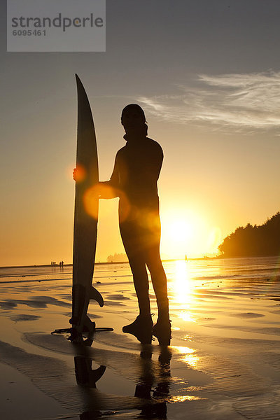 Mann  Sonnenuntergang  Surfboard  britisch