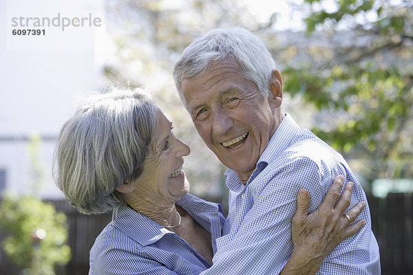 Germany  Bavaria  Senior couple smiling  close up