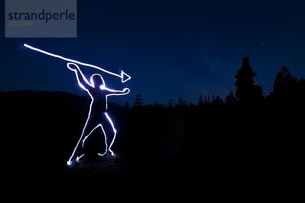 Mann  Sonnenuntergang  Beleuchtung  Licht  über  streichen  streicht  streichend  anstreichen  anstreichend  In der Luft schwebend  Idaho