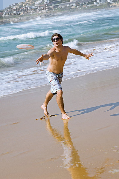 Mann  werfen  Strand  Frisbee