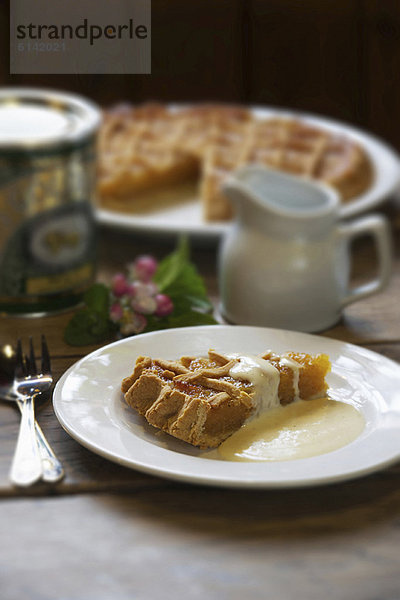 Scheibe Sirupkuchen mit Sahne