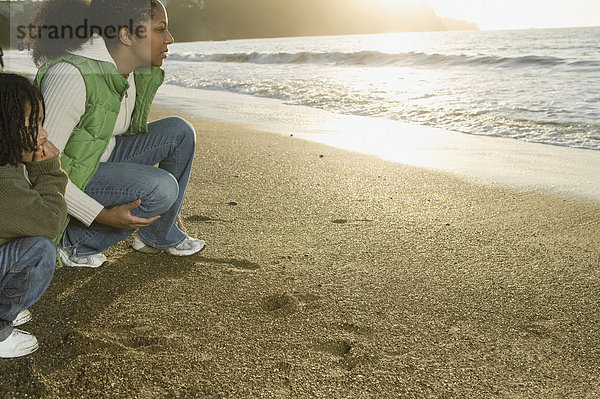 sitzend  Strand  Sohn  Mutter - Mensch