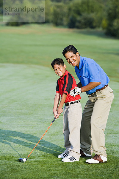 Menschlicher Vater  Sohn  Hilfe  Hispanier  Spiel  Golfsport  Golf