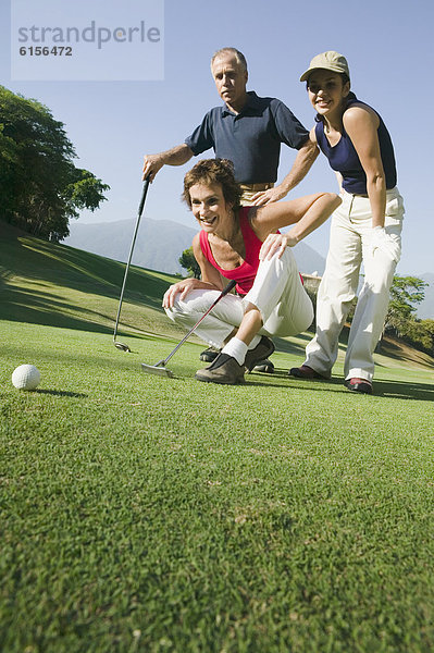 Freundschaft  multikulturell  Golfsport  Golf  spielen