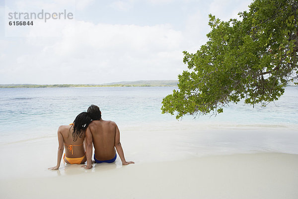 sitzend Strand Südamerika