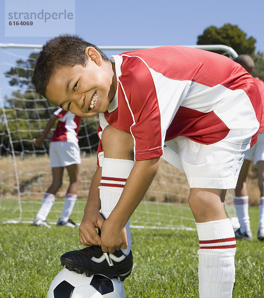 Junge - Person Schuh mischen Fußball Mixed binden