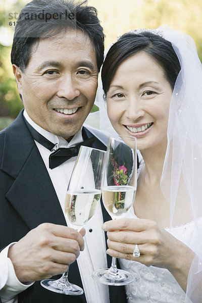 Hochzeit  zuprosten  anstoßen  Champagner