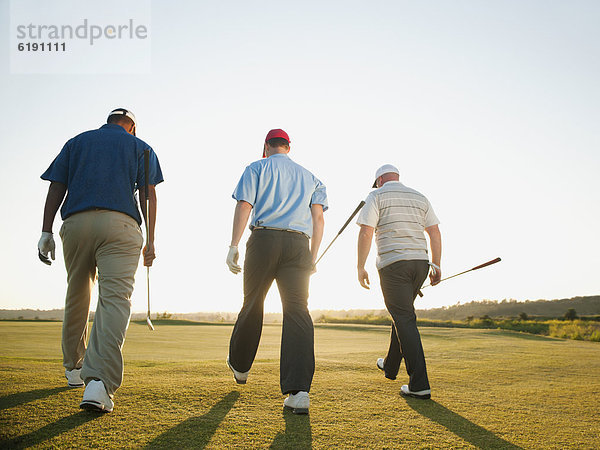 Zusammenhalt  gehen  Golfspieler  Golfsport  Golf  Kurs