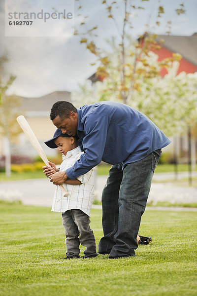 unterrichten  Menschlicher Vater  Sohn  Spiel  Baseball