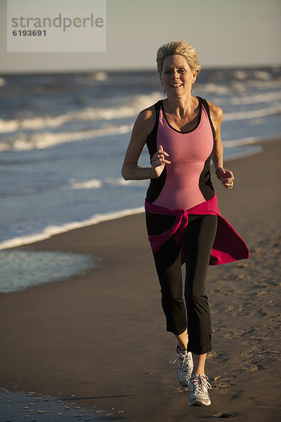 Woman running on beach