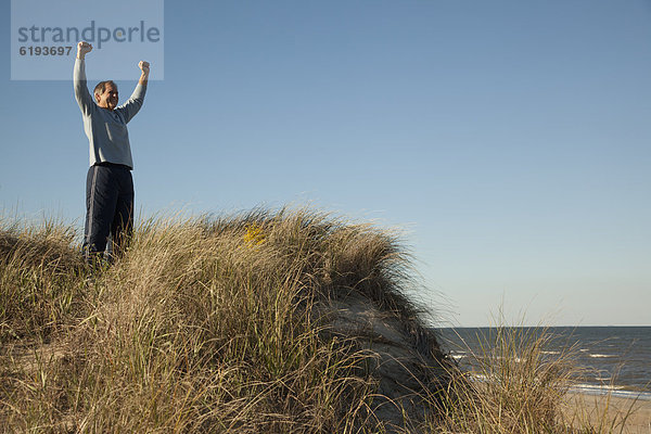 nahe  Mann  jubeln  Ozean  Sand  Düne