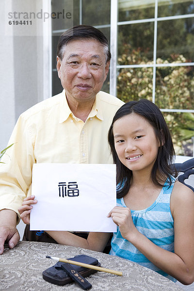 unterrichten  chinesisch  Enkeltochter  Großvater  Handschrift