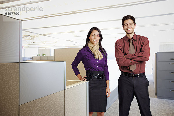Business people standing in office