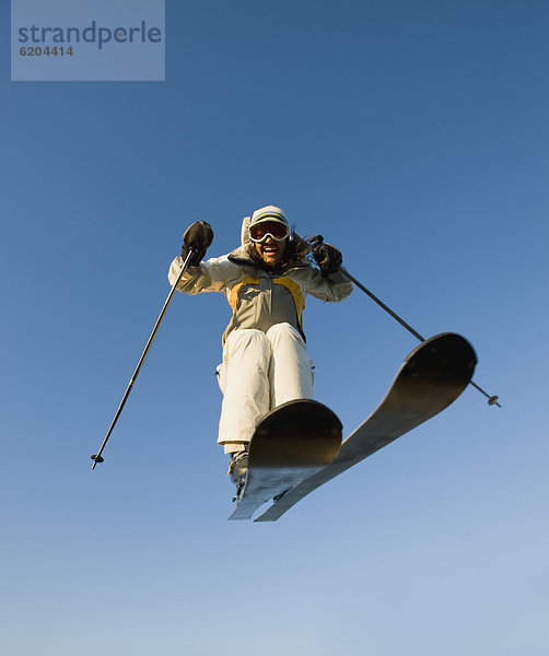 Frau  In der Luft schwebend  Ski  mischen  Mixed