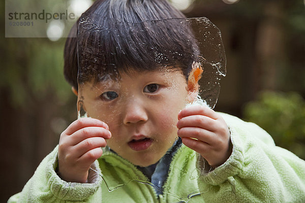 Junge - Person  halten  Eis  südkoreanisch  Tuch