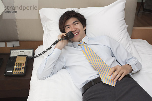 Geschäftsmann  Zimmer  Telefon  Hotel  chinesisch