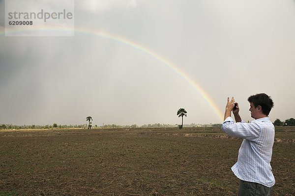 Mann  Fotografie  nehmen  Regenbogen