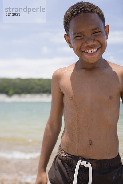 Strand  Junge - Person  Kleidung  schwimmen