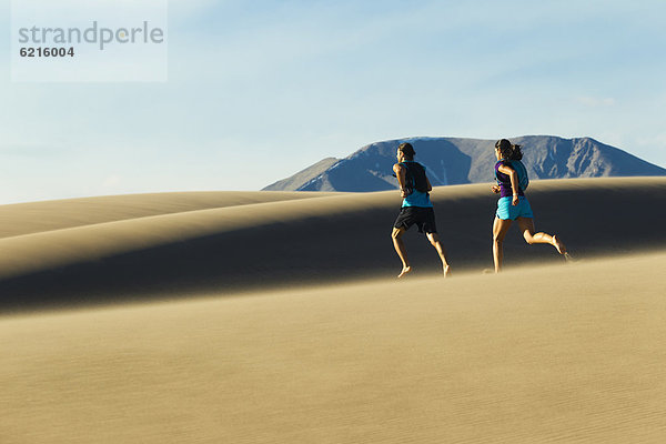 Hispanier  rennen  Sand  Düne