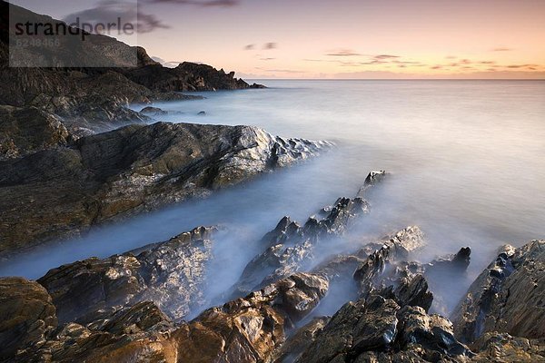 Europa  Winter  Felsen  Sonnenuntergang  Großbritannien  Küste  Devon  England