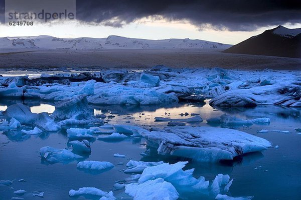 Sonnenuntergang  fließen  blau  Eisberg  Eis  Island  Jökulsárlón  Lagune