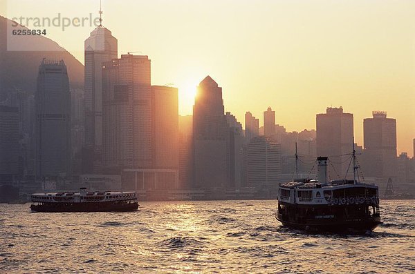 Skyline  Skylines  Hafen  Sonnenuntergang  Insel  China  Asien  Hongkong