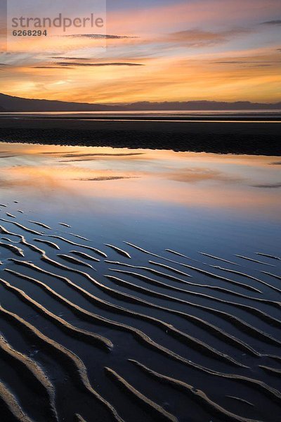 Strand Sonnenuntergang Sand gewellt Pazifischer Ozean Pazifik Stiller Ozean Großer Ozean neuseeländische Südinsel Golden Bay Neuseeland