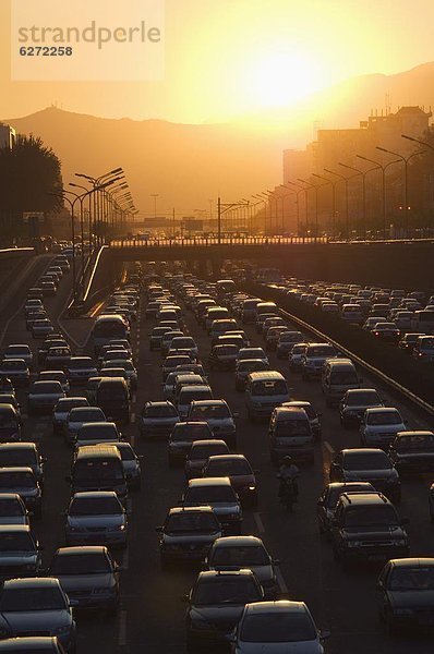 Sonnenuntergang  über  Hektik  Druck  hektisch  Großstadt  Fernverkehrsstraße  Peking  Hauptstadt  Asien  Stunde  klingeln