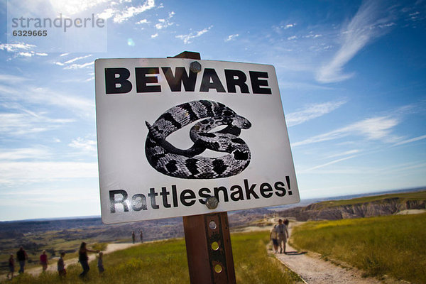 Vorsicht Rattesnakes! Schild im Badlands National Park  South Dakota  USA