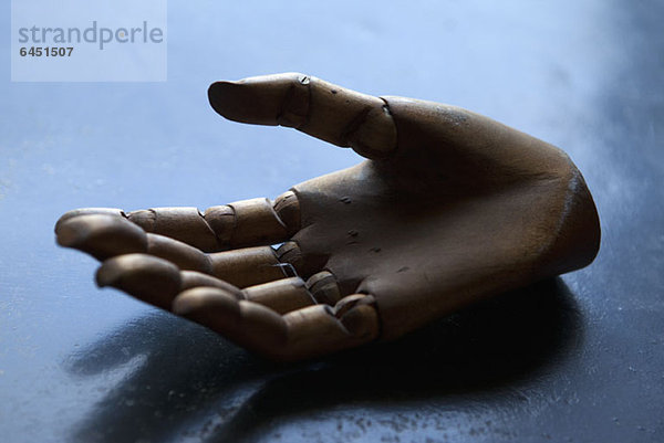 A wooden hand